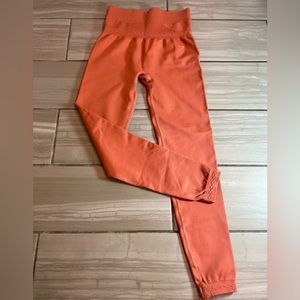NWOT Gymshark Seamless High Waisted leggings. Burnt Orange. Size:XS
